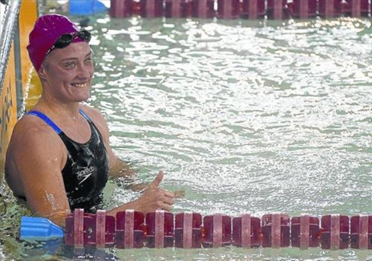 Belmonte somriu feliç a l’haver establert un nou millor registre mundial del 1.500 en piscina curta. Belmonte somriu feliç a l’haver establert un nou millor registre mundial del 1.500 en piscina curta.