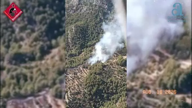 Un incendio forestal junto al embalse de Guadalest moviliza medios aéreos y terrestres