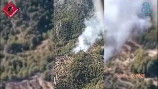Un incendio forestal obliga a movilizar medios aéreos en el pantano de Guadalest