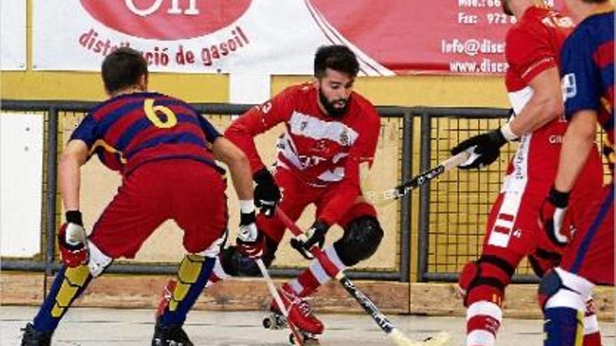 Un moment del partit entre el Citylift Girona i el Barça B d&#039;ahir a Palau 2.