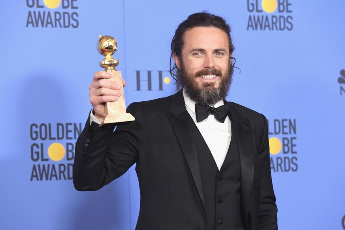 BEVERLY HILLS, CA - JANUARY 08: Actor Casey Affleck, winner of Best Actor in a Motion Picture - Drama for ’Manchester by the Sea,’ poses in the press room during the 74th Annual Golden Globe Awards at The Beverly Hilton Hotel on January 8, 2017 in Beverly Hills, California.   Kevin Winter/Getty Images/AFP