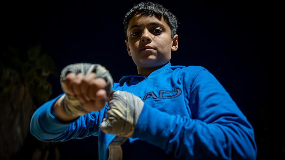 Ellis durante su clase de boxeo en la calle