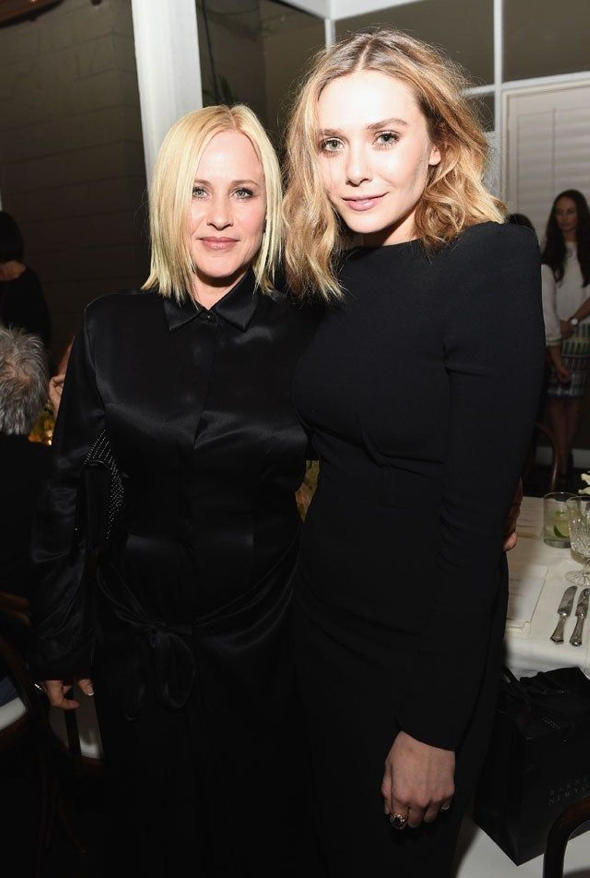 Patricia Arquette y Elizabeth Olsen en la fiesta benéfica para Intermon Oxfam pre Oscar