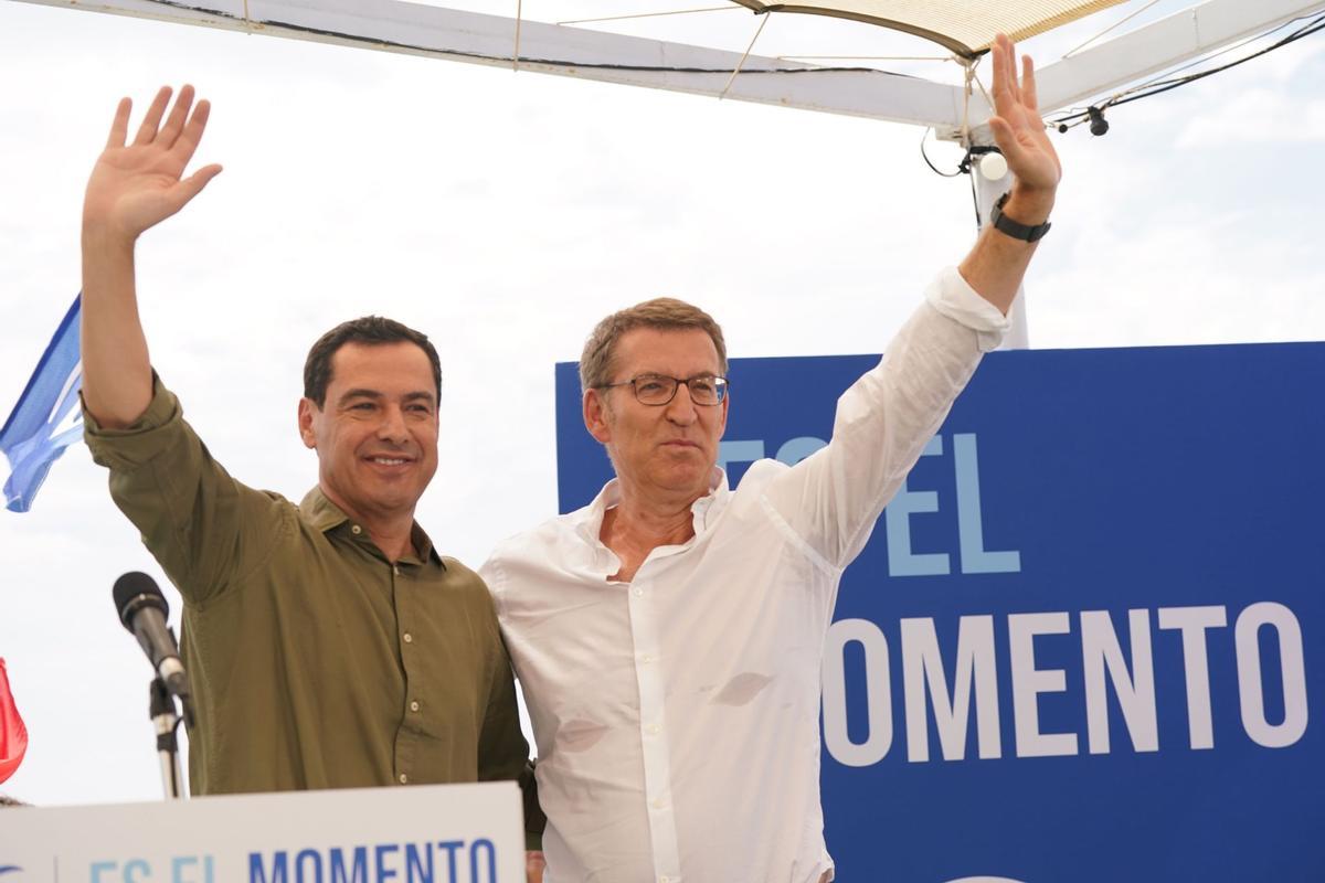 Moreno y Feijóo durante el mitin del PP celebrado este viernes en los Baños del Carmen.