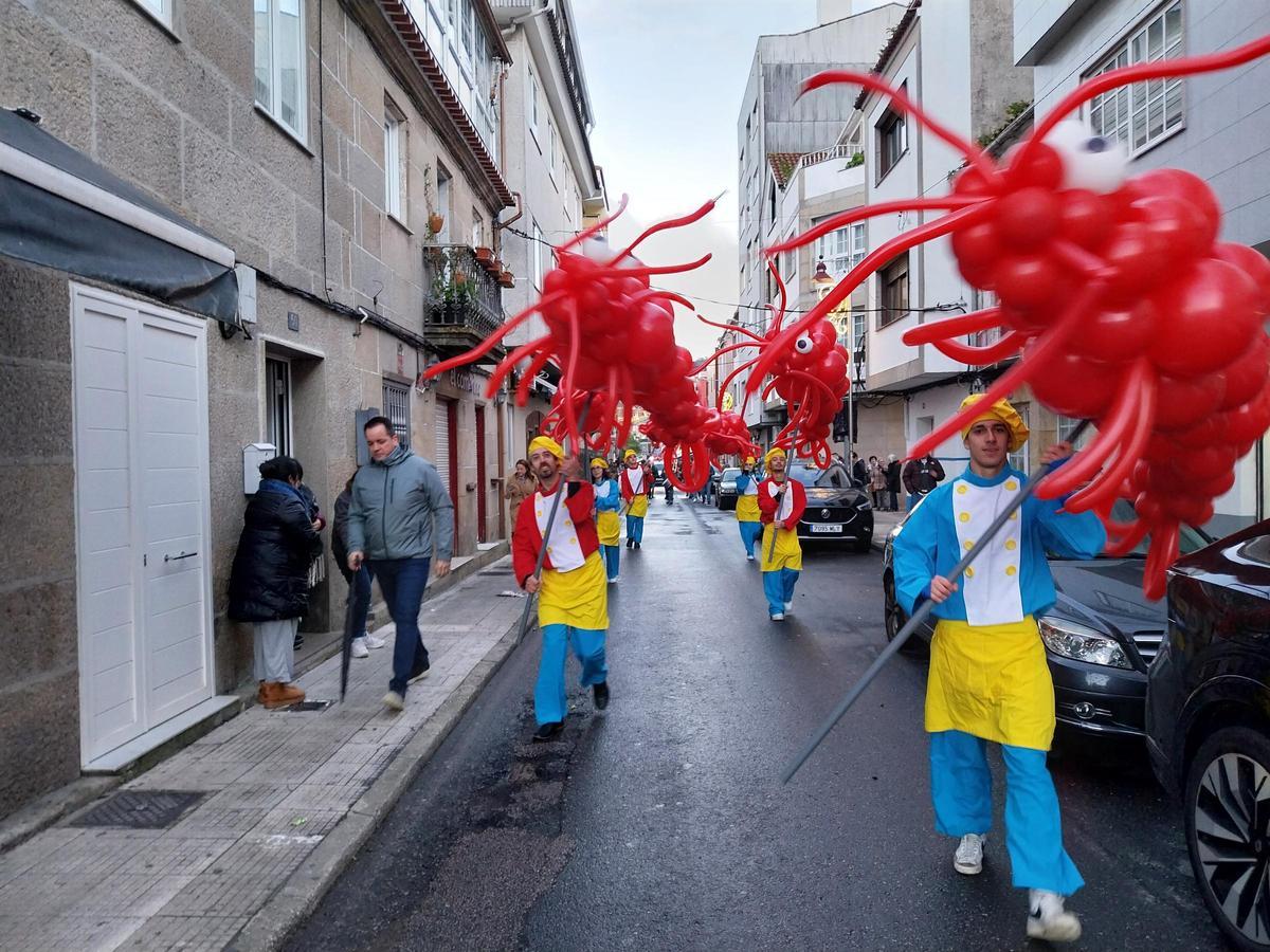 La cabalgata de los Reyes Magos por Bueu a bordo de barcos tradicionales
