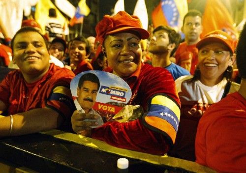 Supporters of Venezuelan presidential candidate Maduro celebrate after the official results gave him a victory in Caracas