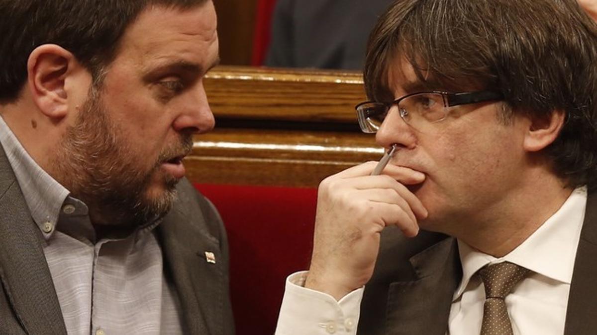 Carles Puigdemont y Oriol Junqueras.