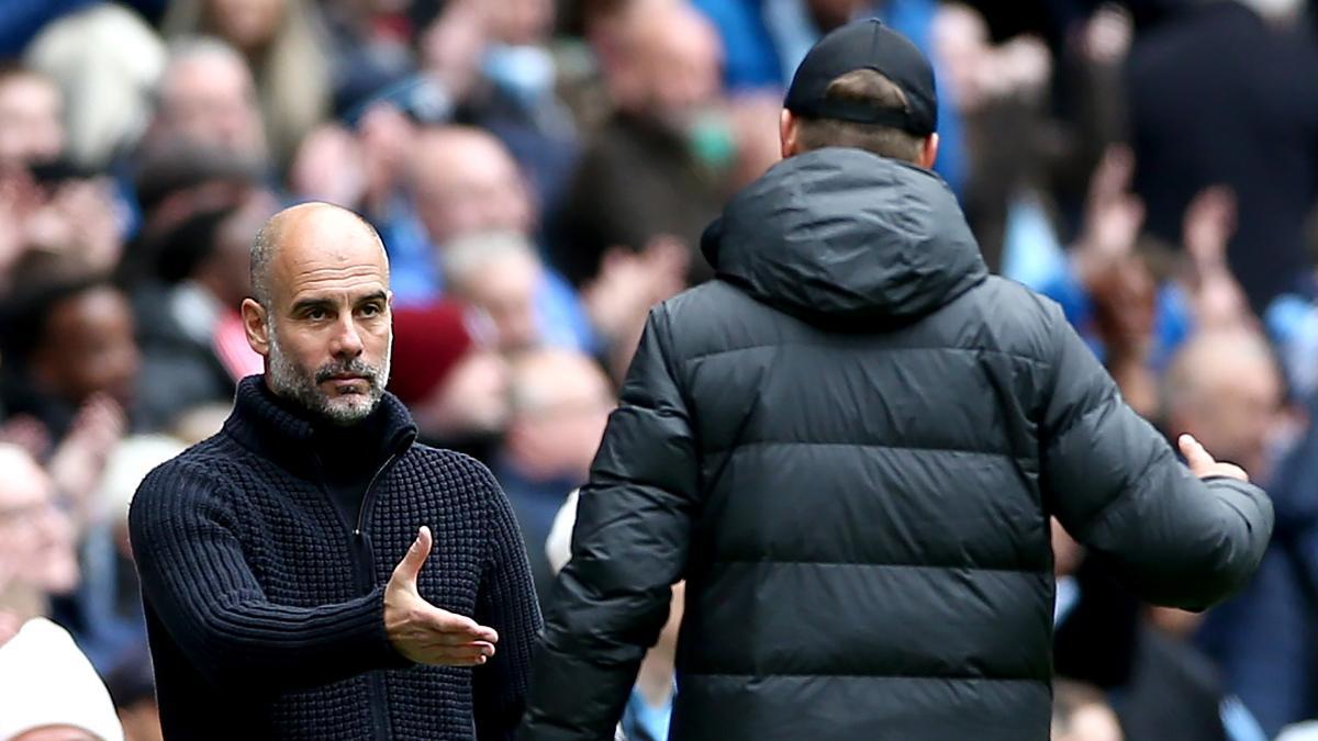 Pep Guardiola y Jürgen Klopp, antes de un partido de Premier League