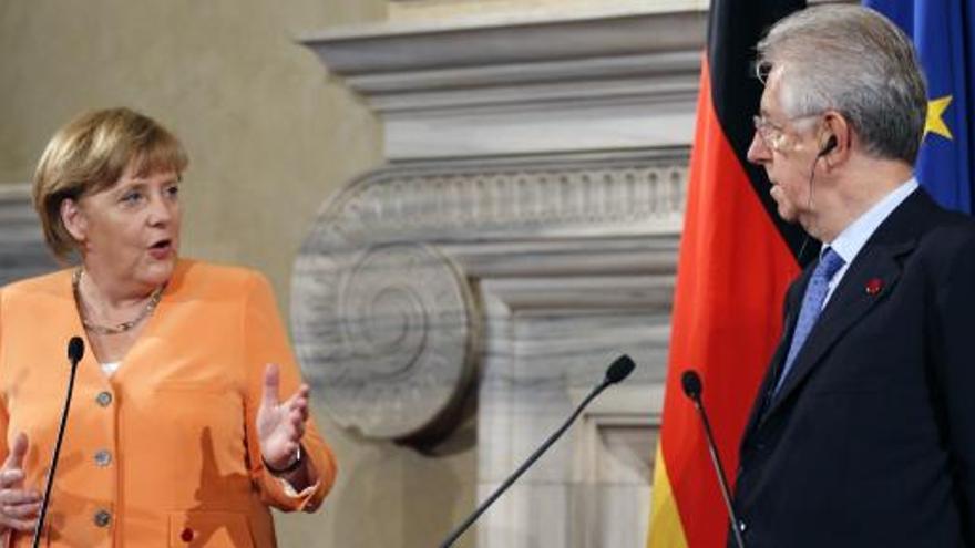 Merkel se dirige a Monti.
