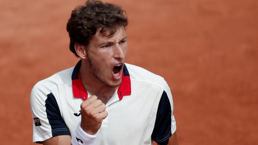 Pablo Carreño celebra un tanto ante Raonic.