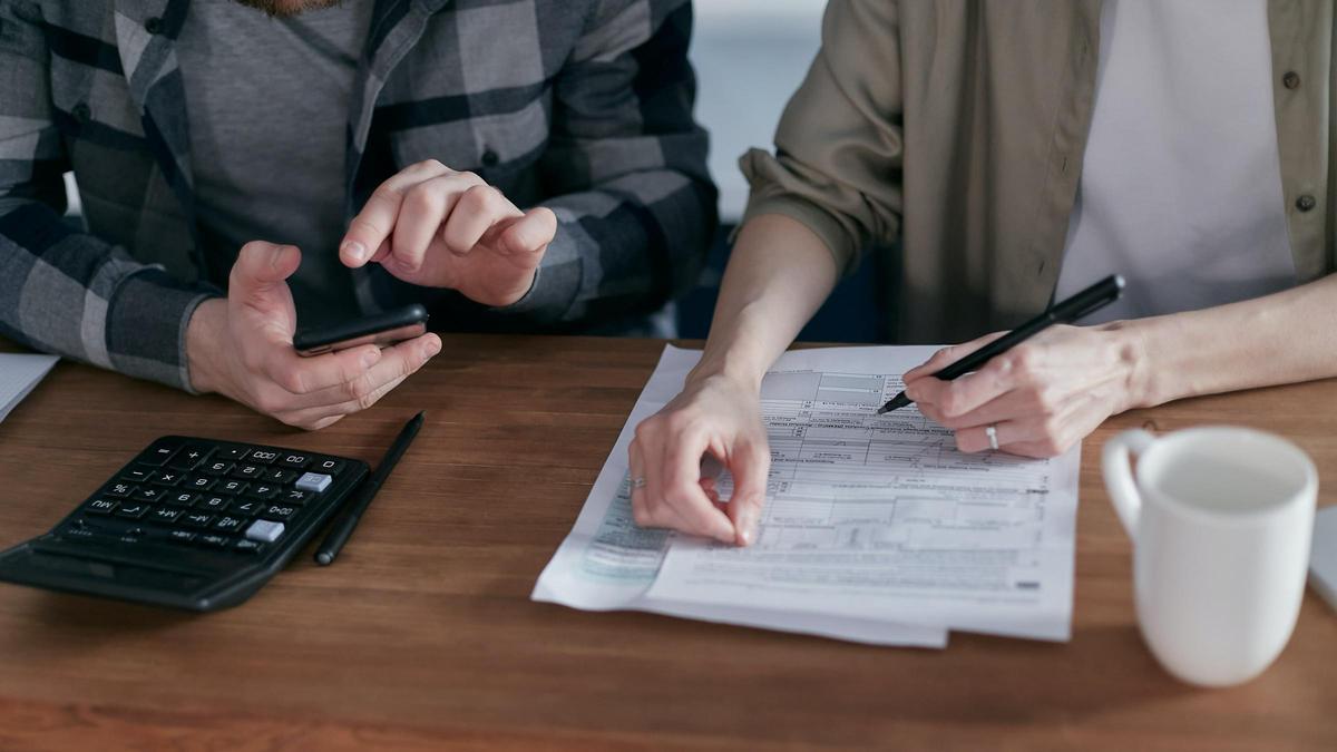 Two people file the income tax return.