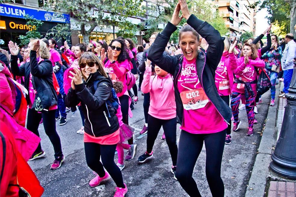 Las imágenes de la marcha y la carrera rosa de Cáceres