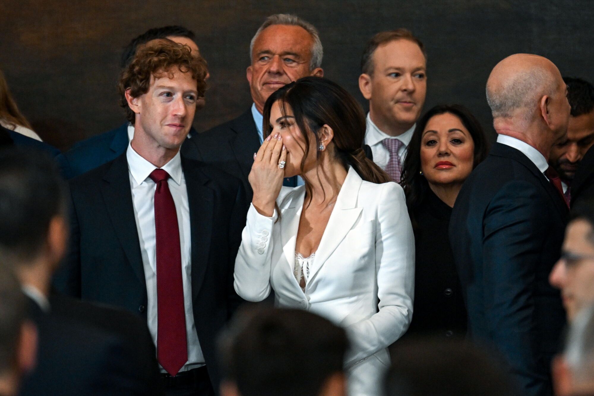 Washington (United States), 20/01/2025.- (L-R) CEO of Meta and Facebook Mark Zuckerberg, Lauren Sanchez and Amazon founder Jeff Bezos arrive before the inauguration of Donald Trump as the 47th president of the United States takes place inside the Capitol Rotunda of the U.S. Capitol building in Washington, D.C., USA, 20 January 2025. It is the 60th U.S. presidential inauguration and the second non-consecutive inauguration of Trump as U.S. president. (Estados Unidos) EFE/EPA/KENNY HOLSTON / POOL