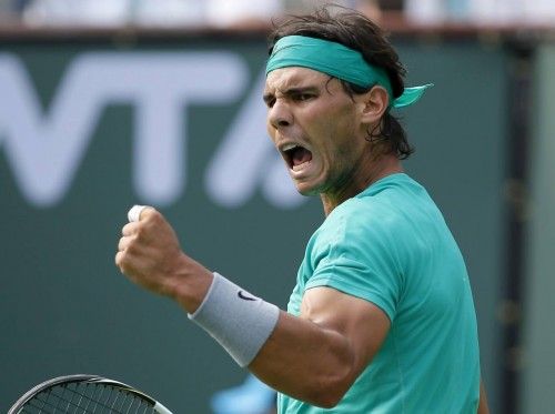 Nadal of Spain celebrates breaking the serve of Del Potro of Argentina at the BNP Paribas Open tennis tournament in Indian Wells, California