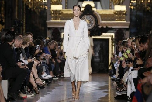 Model Josephine Le Tutour presents a creation by British designer Stella McCartney as part of her Spring/Summer 2015 women's ready-to-wear collection during Paris Fashion Week