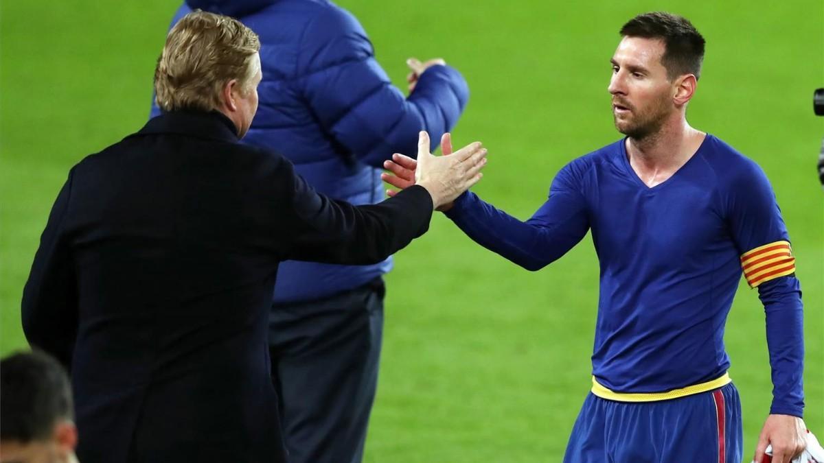 Koeman y Messi, al final de un partido