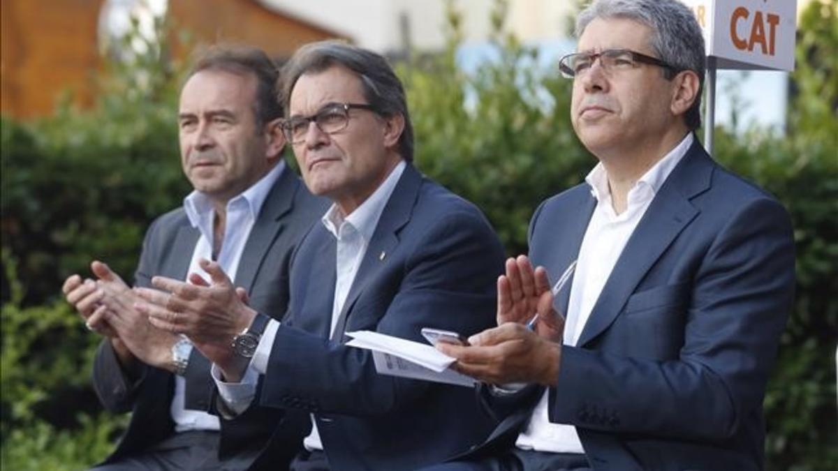 'Mikimoto', Artur Mas y Francesc Homs, en el mitin de CDC en Sabadell.