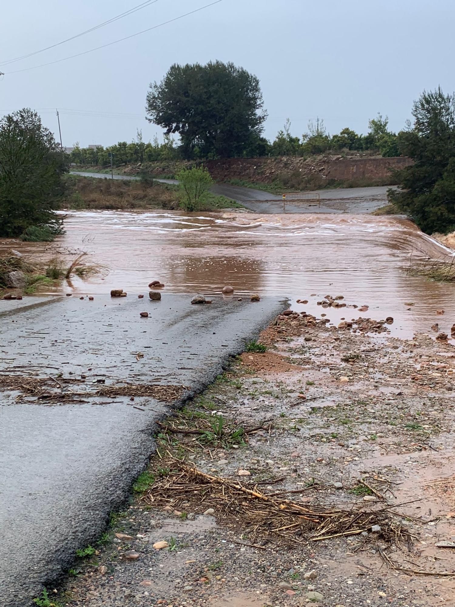 El barranco del Carraixet, desbordado por las lluvias