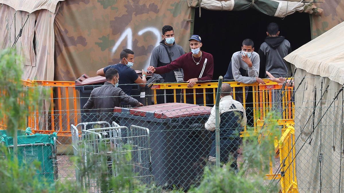 Inmigrantes en el campamento de Barranco Seco