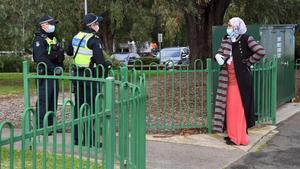 zentauroepp54012525 police speak to a woman outside one of nine public housing e200706080359