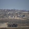 An Israeli army APC moves along the border of the Gaza Strip in southern Israel, Wednesday, Aug. 6, 2025. (Photo/Ohad Zwigenberg)