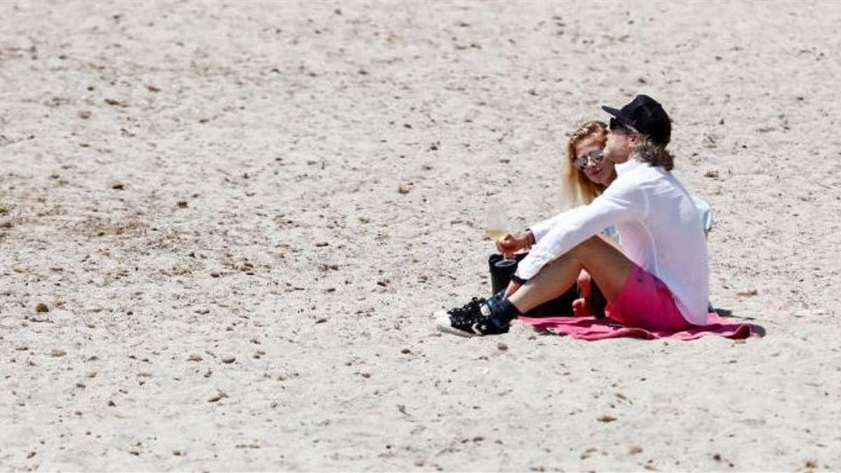 Turistas en la playa