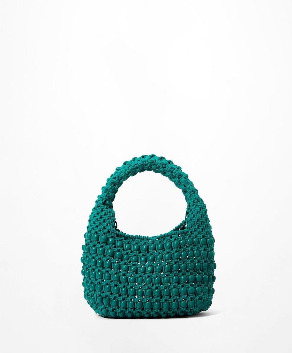 Bolso de bolitas de Oysho (precio: 29,99 euros)