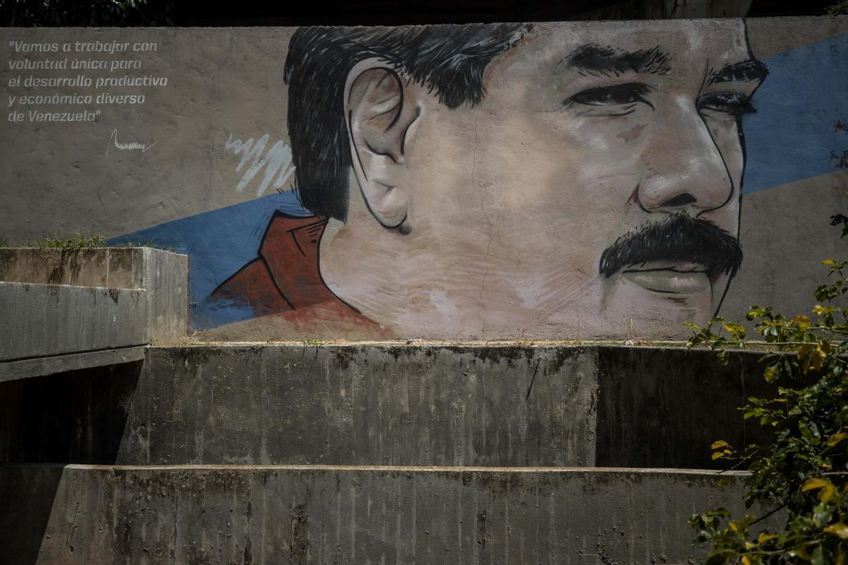 Fotografía de un graffiti con la imagen del presidente de Venezuela, Nicolás Maduro.
