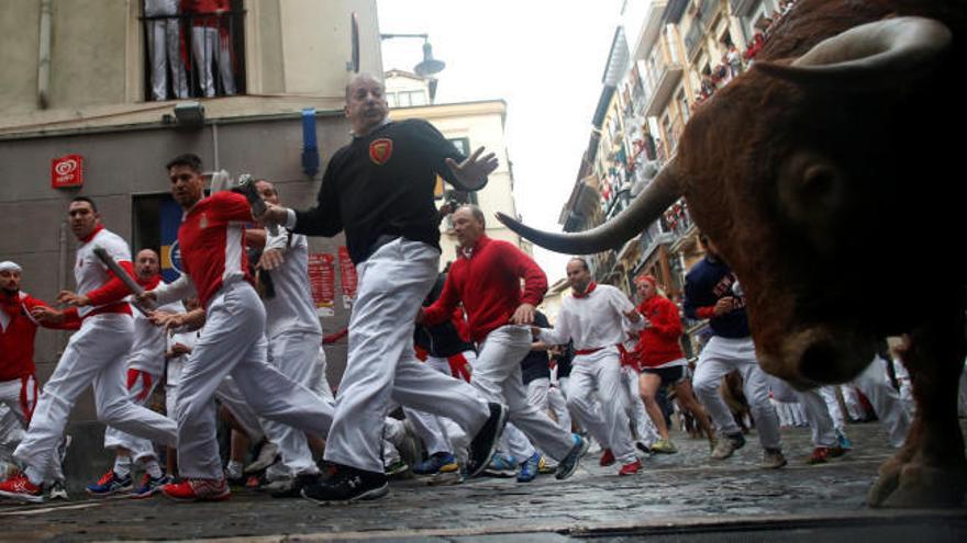 Un herido por asta de toro en el séptimo encierro de San Fermín