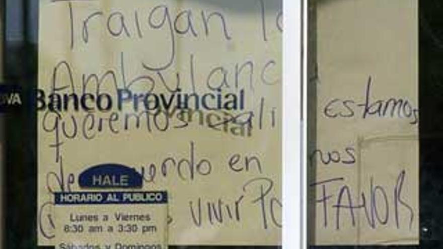 Huyen con 5 rehenes los atracadores de una sede del BBVA en Venezuela