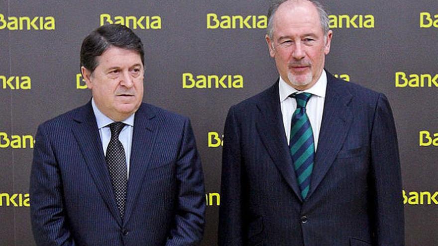 Rodrigo Rato y José Luis Olivas.