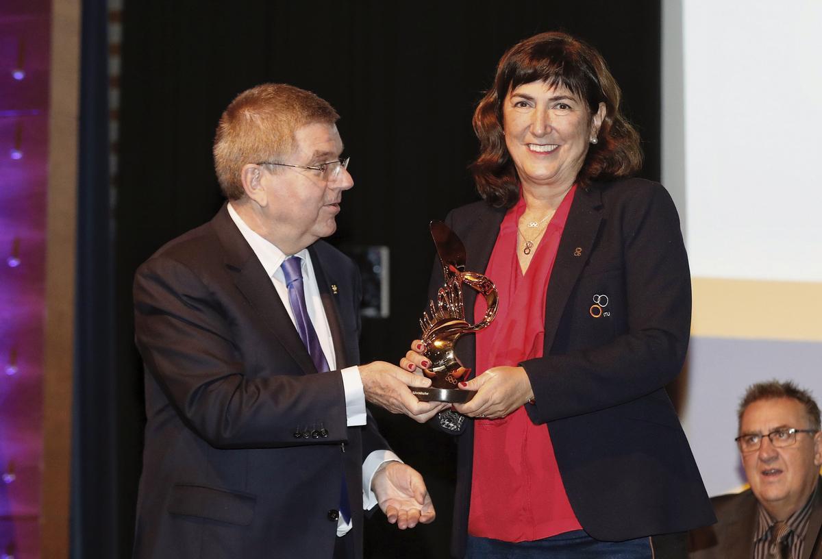 Los presidentes del COI y de la Federación Internacional de Triatlón, Thomas Bach y Marisol Casado.