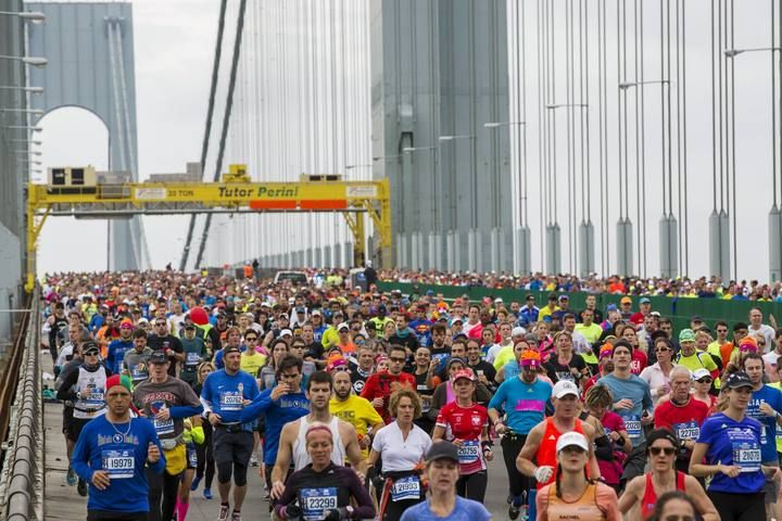 Runners cross the Verrazano-Narrows Bridge shortly after the start of the New York City Marathon in New York