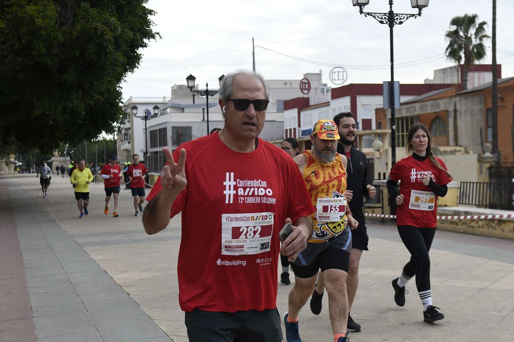 La XIII carrera solidaria Corriendo con Assido, en imágenes