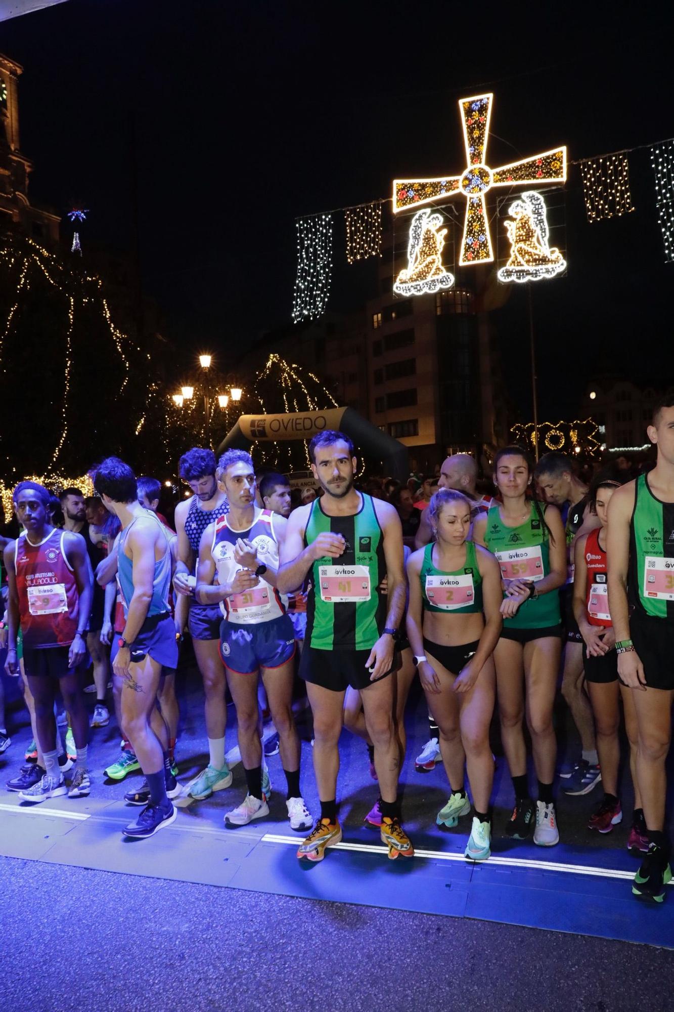 En imágenes: Jaime Bueno (Univerisad de Oviedo) y Mariam Benkert triunfan en la San Silvestre de Oviedo