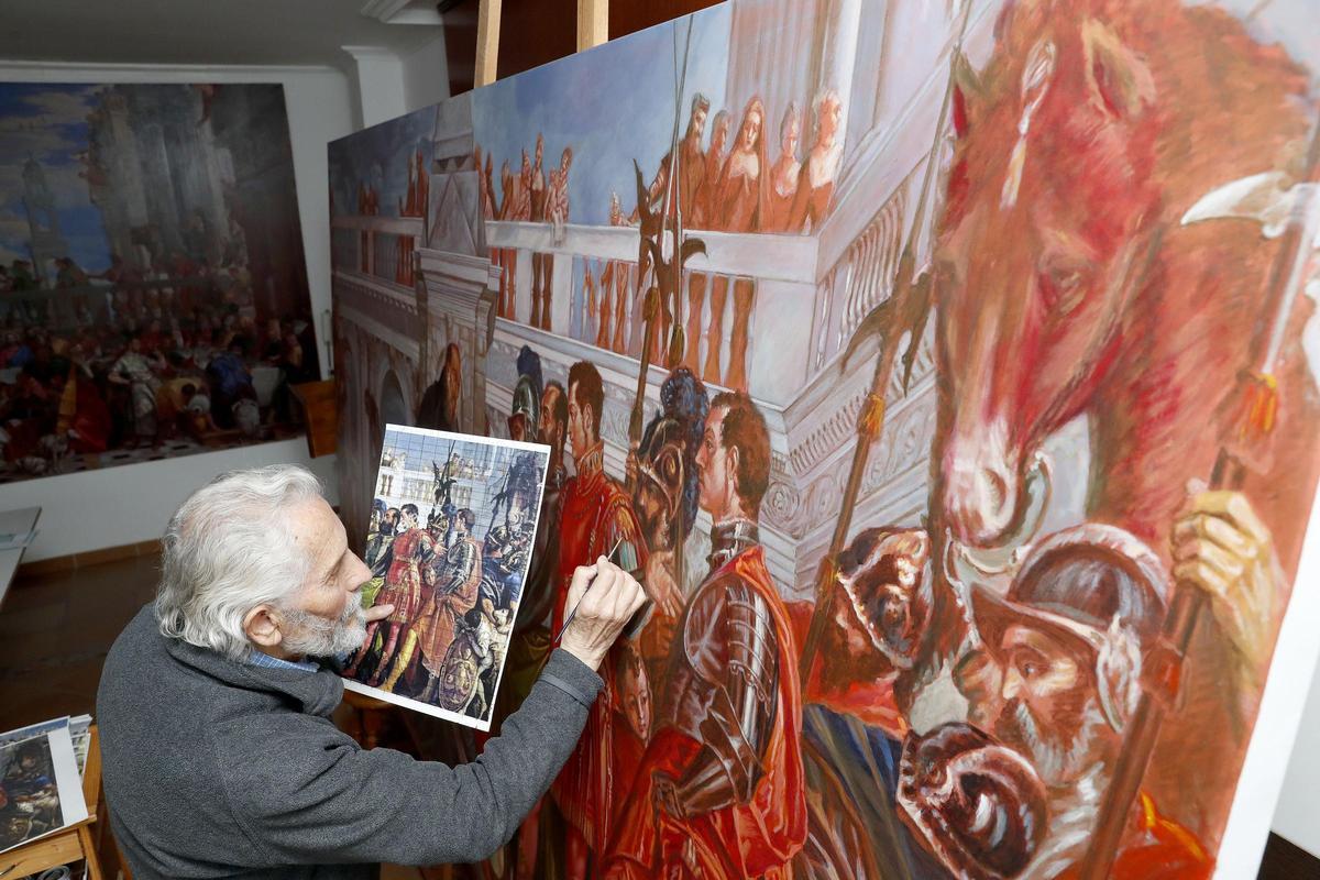 Ángel Barros traballando nun cadro.