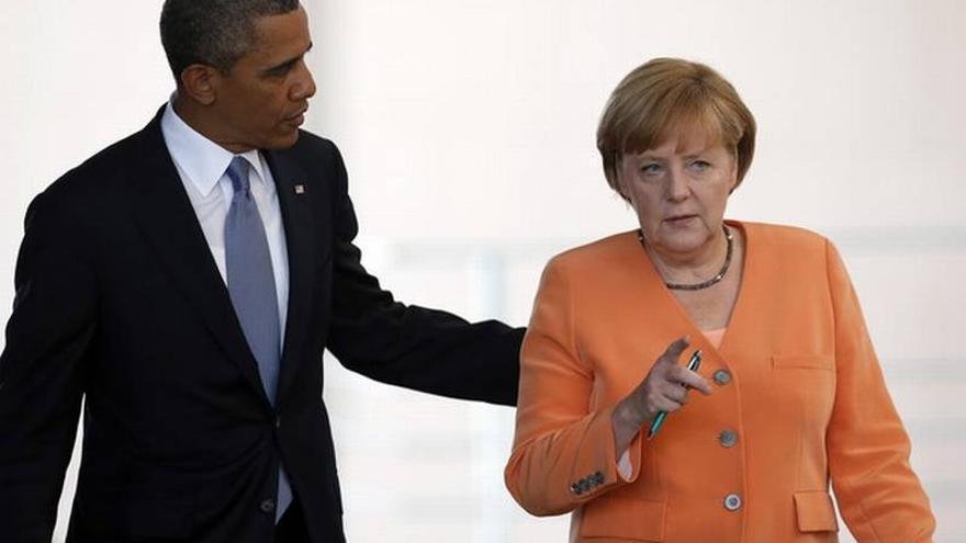 Obama y Merkel coinciden en enviar observadores a Ucrania para desactivar el conflicto