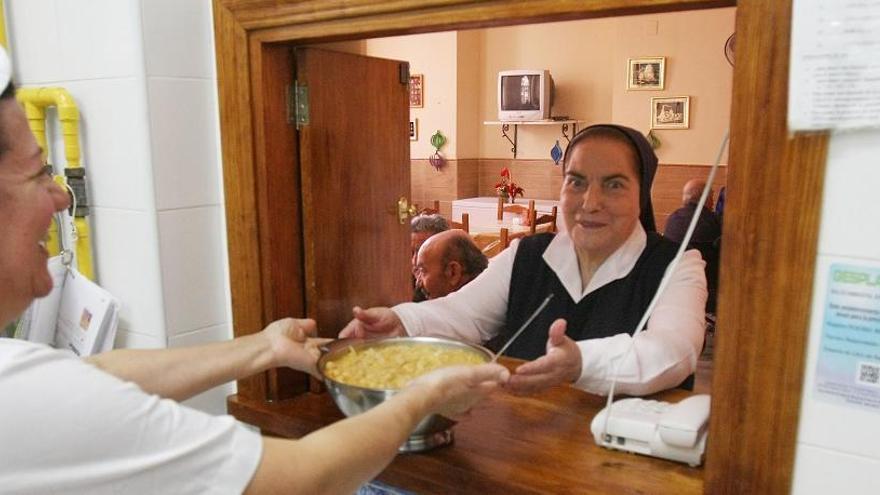 Comedor de Cáritas en el Hogar de Pozos Dulces.