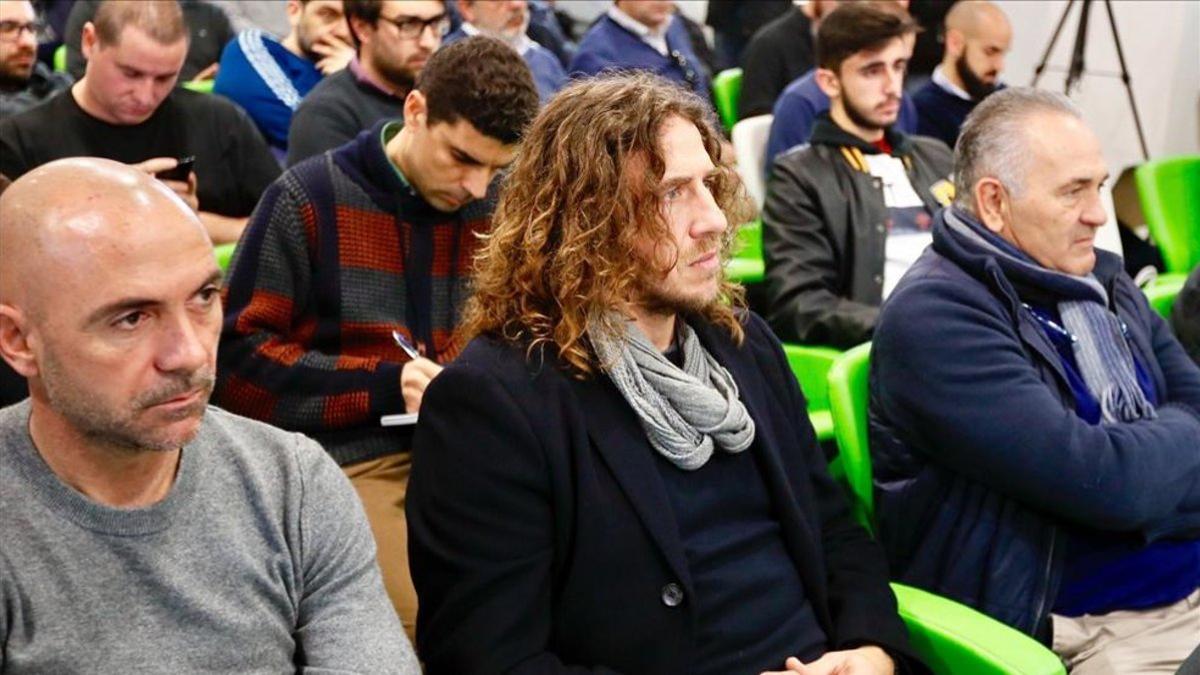 Carles Puyol junto a Iván de la Peña en su etapa como representante de jugadores