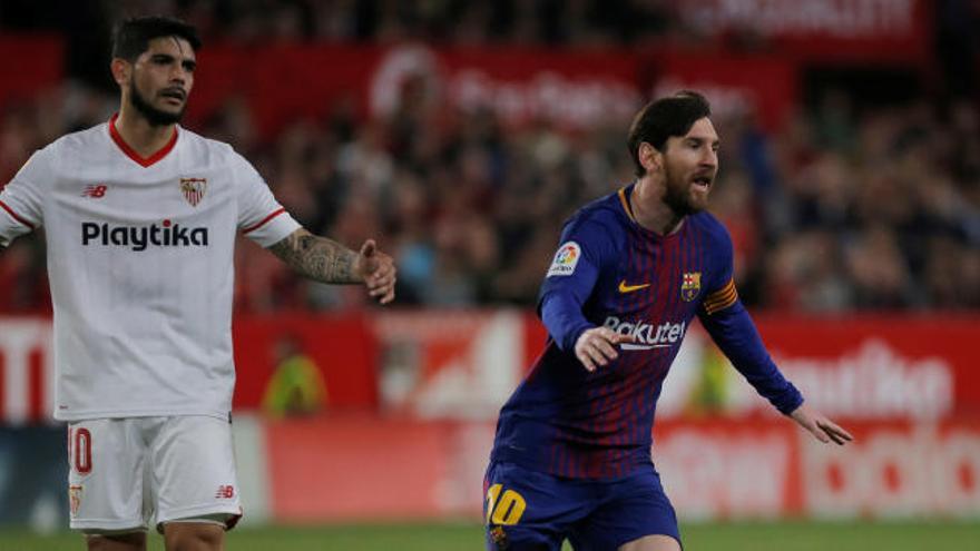 Messi y Ever Banega.