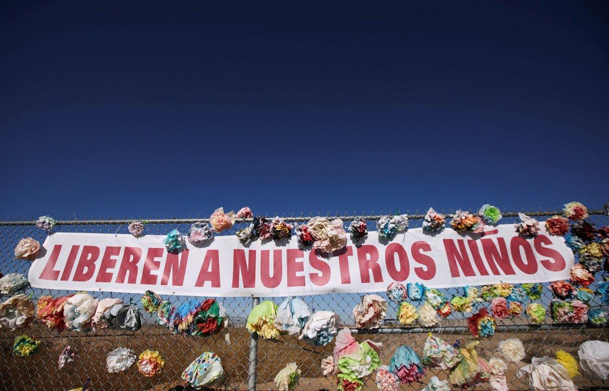 A banner placed by activists hangs from a fence near a tent city in Texas for migrant teens  which the U S  government on Friday said will be closed  next to the Mexican border in Tornillo  Texas  U S   January 12  2019  The banner reads  Let our Children go   REUTERS Jose Luis Gonzalez