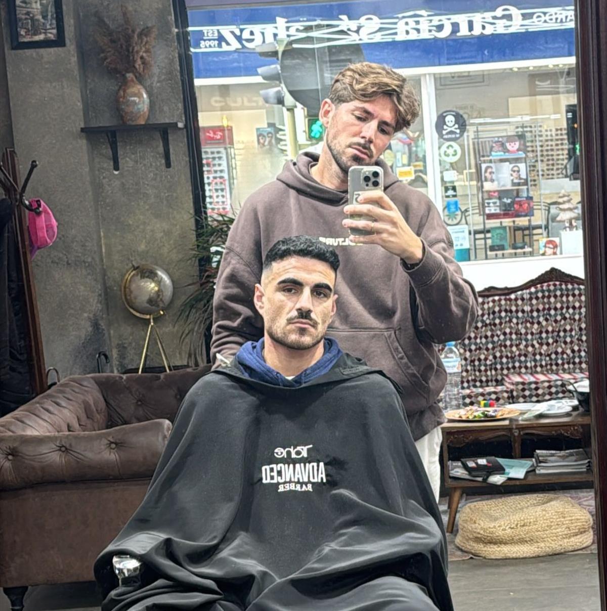 David Preciado con Diego Díaz, jugador del Extremadura y cliente.