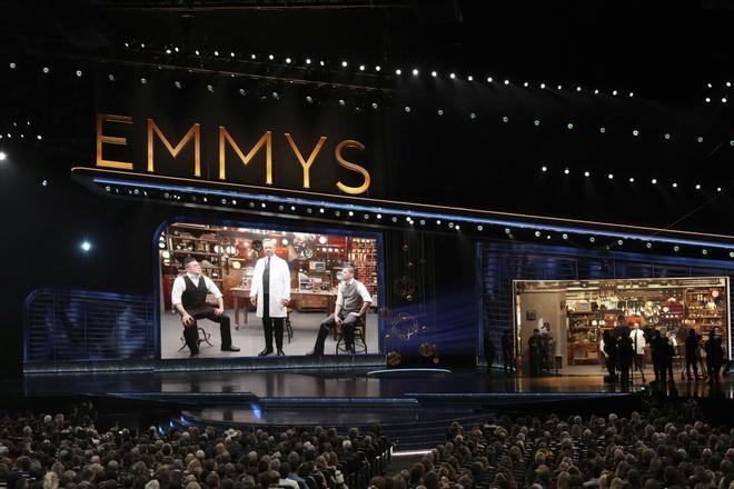 Bowen Yang, from left, Host Nate Bargatze, and Mikey Day during the 77th Primetime Emmy Awards on Sunday, Sept. 14, 2025, at the Peacock Theater in Los Angeles. (AP Photo/Chris Pizzello). 091425132020, 21334631,