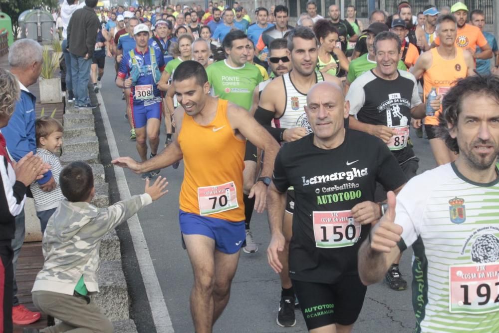 Prieto y Figueroa se cuelgan el oro en la 21K Costa da Vela. // Santos Álvarez