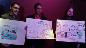 Xavier Carrasco , Cels Piñol y Nacho Fernández (izquierda a derecha), con los dibujos que han improvisado en la convocatoria del Premi de Còmic Costa Brava.