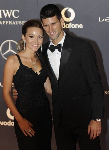 Tennis Player Novak Djokovic and his girlfriend Jelena Ristic pose for photographs as they arrive for the the Laureus World Sports Awards 2012 in central London