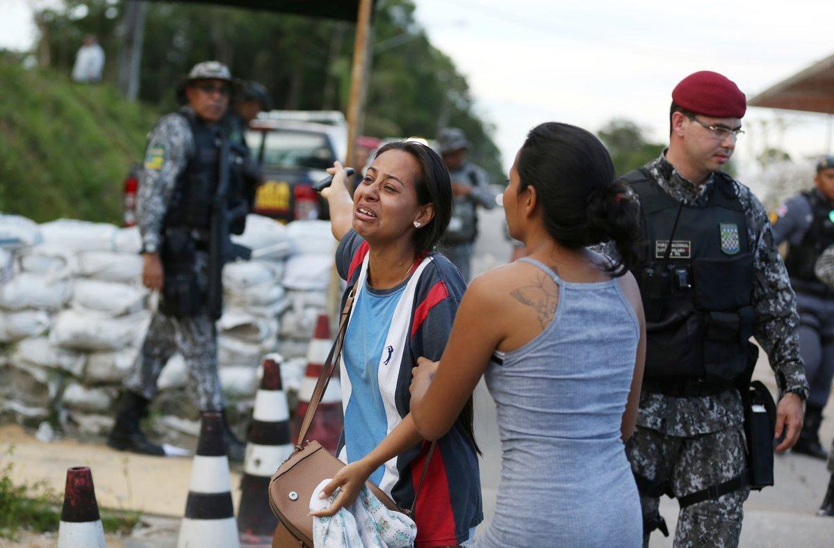 Relatives of inmates react in front of a prison complex in the Brazilian state of Amazonas after prisoners were found strangled to death in four separate jails  according to the penitentiary department in Manaus  Brazil May 27  2019  REUTERS Bruno Kelly