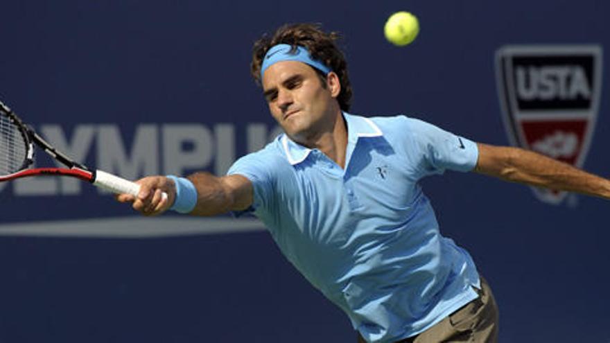 El tenista suizo Roger Federer celebra un punto ante el alemán Andreas Beck