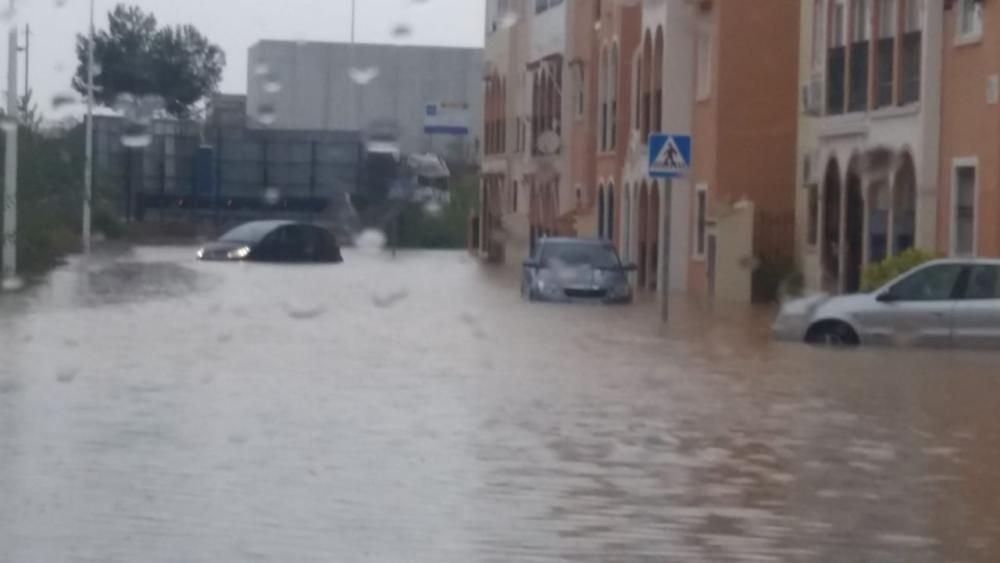 Desperfectos e inundaciones generadas por la tromba de lluvia que ha descargado en Torrevieja