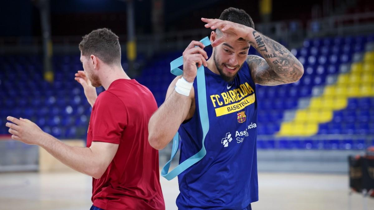 Willy Hernangómez, junto a Joel Parra